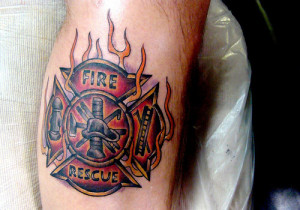 Firefighter Girl Tattoo On Shoulder