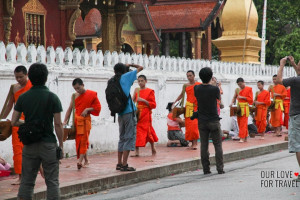 Tak Bat ceremony in Luang Prabang is supposed to be a holy Buddhist ...