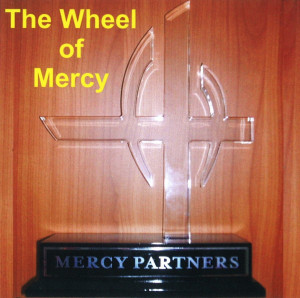 This CD contains one track entitled “The Wheel of Mercy ...