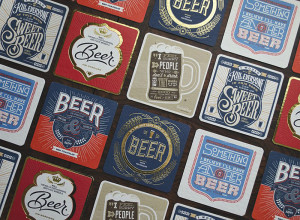 This complete collection of 6 letterpress coasters with display stand ...