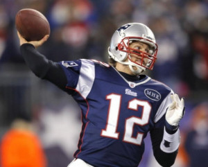 New England Patriots quarterback Tom Brady throws a pass against the ...