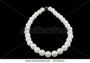 ... Black Background White pearl necklace on a black background - stock