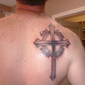 This man has got a cross along with The Bible verses for which he has ...