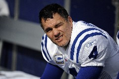 Indianapolis Colts kicker Adam Vinatieri sits on the bench in the ...