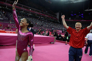 Gabby Douglas waves to the audience after her final and deciding ...