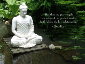 white satute of Gautama buddha with quotes