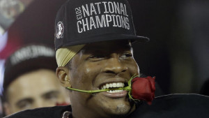 Florida State's Jameis Winston holds rose in his mouth after NCAA BCS ...