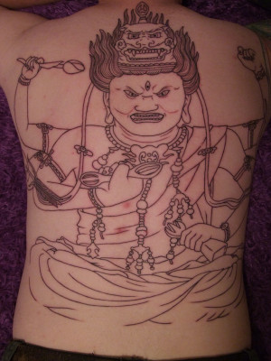 Beautiful Buddhist Tattoo Design on Back 2011