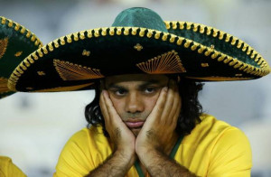 Brazil fan reacts after the team's 2014 World Cup semi-finals against ...