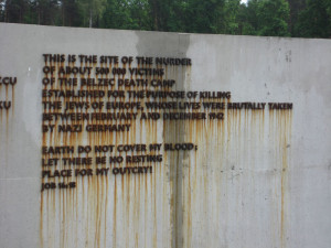 Entrance to Belzec memorial Inscribed cast iron plate in form of a ...