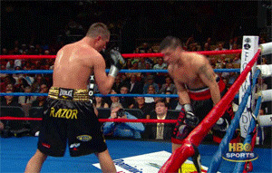 Sergio Martinez— faints his right hand jab forcing his opponent to ...