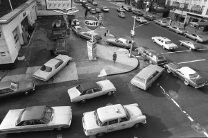 Cars line up in two directions at a gas station in New York City on ...