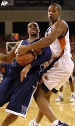 Villanova's Allan Ray, left, and Bucknell's Donald Brown attle for a ...