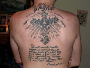 the cross with the heart in the name of god showcased on your back