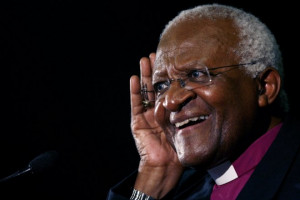 Archbishop Desmond Tutu gestures at the launch of a human rights ...