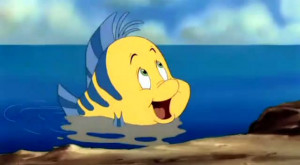Flounder - a bright yellow and golden blue colored tropical fish