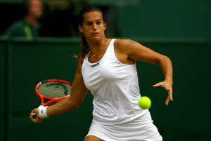Amelie Mauresmo plays a forehand in her match against Dinara Safina