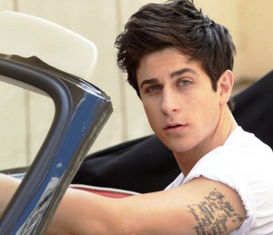 david henrie sports a bible quote tattoo on his arm
