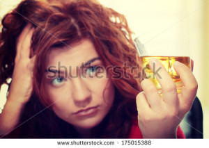 Alone young woman in depression, drinking alcohol (burbon) - stock ...