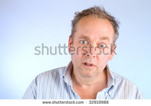 Serious and Scruffy Looking Man - stock photo
