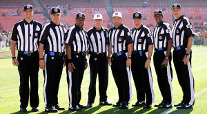 Replacement officials pose for a photo prior to a preseason game over ...
