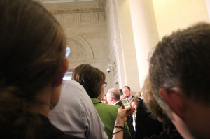 Click on photo to enlarge or download: Reporters monitor a hallway in ...