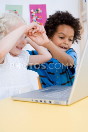 80472330-children-fighting-over-laptop-computer-photos-com.jpg?v=1&c ...