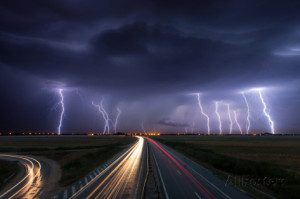 Thunderstorm and Lightnings in Night over A Highway with Car Lightning ...