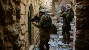 Israeli soldiers in the West Bank city of Hebron during search efforts ...