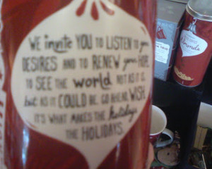 This was on the tall coffee mug at Starbucks in the Christmas display.