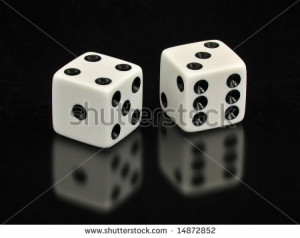 Two White Dice With The Lucky Number Seven Showing Are