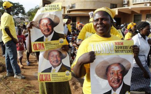 Supporters of Uganda's President Yoweri Museveni celebrate his victory ...