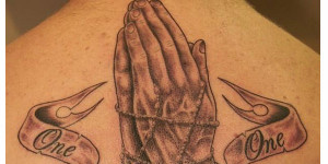 More Information on Praying hands, rosary beads & lettering tattoo