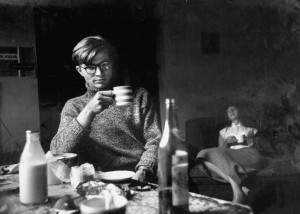 Colin Wilson drinking tea, or perhaps wine in a cup with girlfriend ...