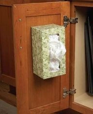 Put grocery store bags in a empty tissue box and store on the inside ...