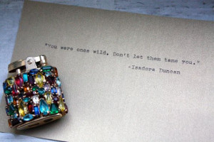 Isadora Duncan quote typed on vintage typewriter on metallic paper