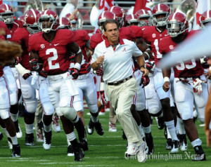 Alabama Coach Nick Saban leads his team to the field for the Florida ...