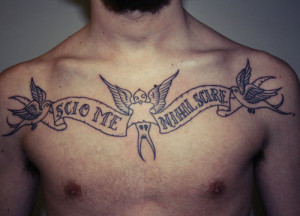 latin live quote tattoo on chest