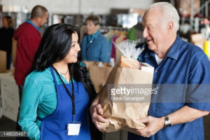 title senior man talking to food donation volunteer caption senior man ...