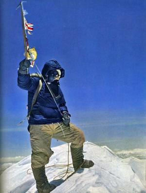 Tenzing Norgay holds his ice axe above the summit of Mount Everest ...