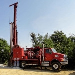 The T455WS is a maneuverable and compact truck mounted drill rig ...