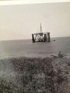 Oil rig in the bay, 1960's