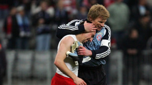 Franck Ribery (L) of Bayern Munich is hugged by goalkeeper Oliver Kahn