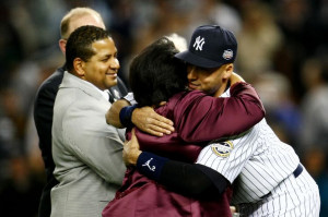 Vera Clemente hugs Derek Jeter, who received the award named for her ...