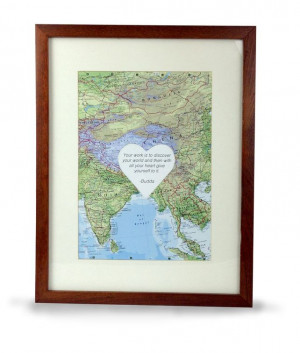 Framed personal map collage and Buddha quote in a heart.