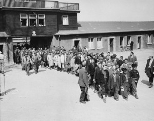Escorted by American soldiers, child survivors of Buchenwald file out ...