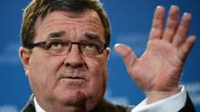 Finance Minister Jim Flaherty holds a press conference in the media ...
