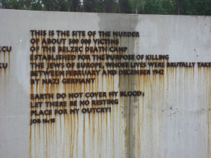 wall quote in rusted cast iron from biblical book of job