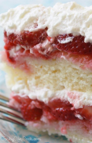 ... cake made with fresh berries and covered with whipped cream…Wow