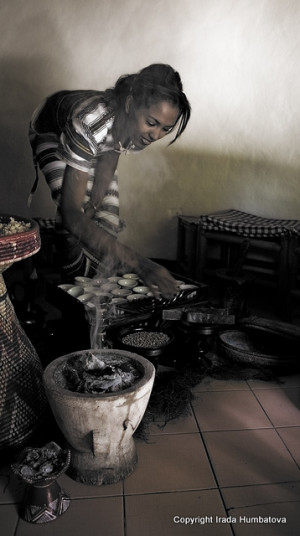 Ethiopian coffee ceremony - a woman serving coffee in true traditional ...